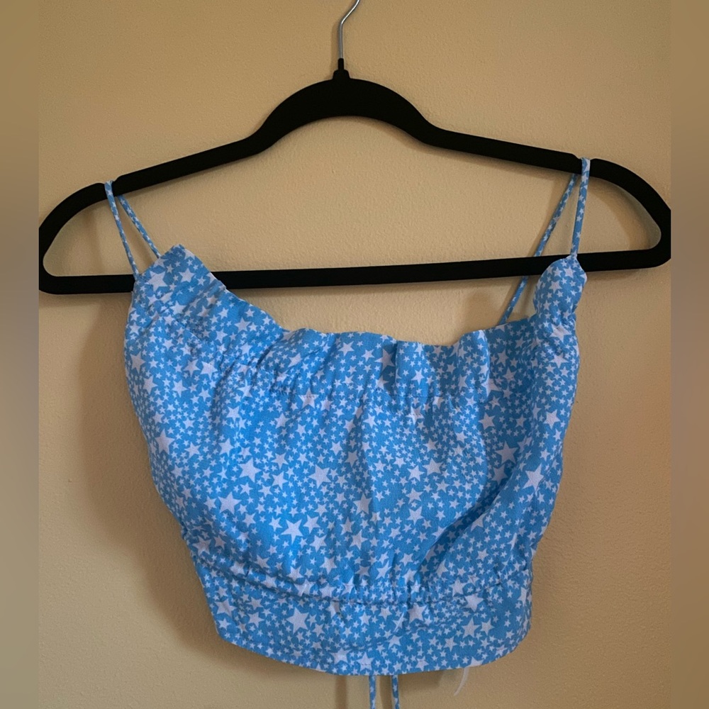 New with tags blue open back tank top. Originally from twenty5A.